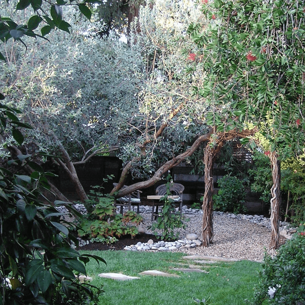 A serene and beautiful secret garden with a flagstone path